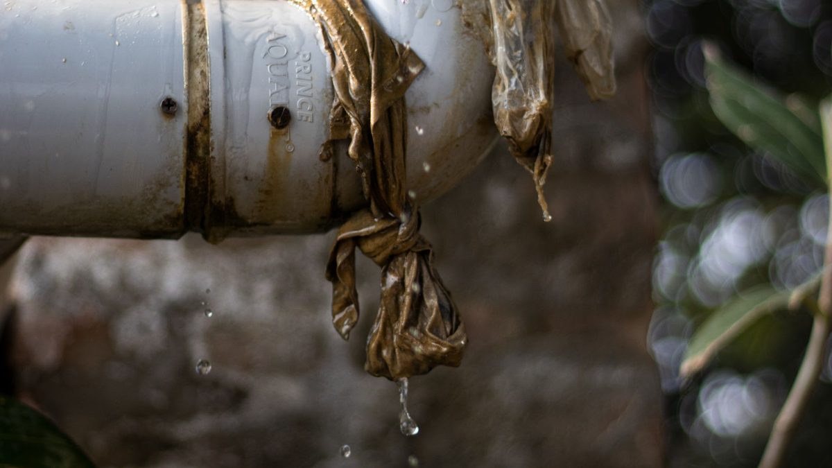 Plastic water pipe split open and leaking